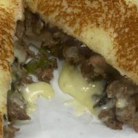 Texas Cheesesteak (New) · Shredded Angus Beef or chicken on Texas toast topped with bell peppers, onions, mushrooms, a...