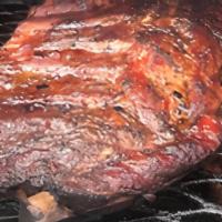 Rib Dinner · Slow smoked St. Louis style pork ribs, Served with baked beans and potato salad and Texas to...