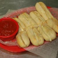 Spicy Stix · Bread sticks with spicy pepper jack cheese and garlic butter.