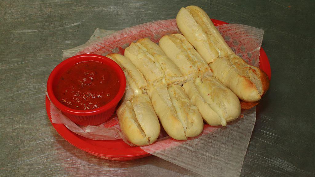 Spicy Stix · Bread sticks with spicy pepper jack cheese and garlic butter.