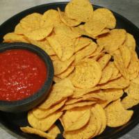 Chips & Salsa · Gluten free corn tortilla chips served with salsa.