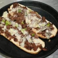 S. Pizza’S Philly Cheesesteak · Roasted beef or fajita chicken topped with green bell peppers and onions, baked on a sourdou...