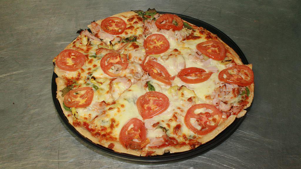 Judy’S Favorite (Gluten Free) · Roasted turkey, marinated artichoke hearts, fresh spinach, garlic, olive oil and Roma tomatoes with red sauce, mozzarella, feta, pepper jack and Parmesan.