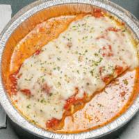 Lasagna · Ground beef, mozzarella and ricotta cheese with our special sauce on the side. Served with a...