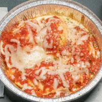 Stuffed Shells  · Stuffed whit ricotta cheese special marinera sauce melted mozzarella on top. Served whit sid...