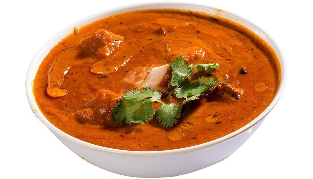 Butter Chicken · Butter chicken or murg makhani is a dish, originating in the Indian subcontinent, of chicken in a mildly spiced cashew, tomato sauce and added butter.
Main ingredients: Spice, Yogurt, Butter, Chicken, Peppers, Tomato, Garlic