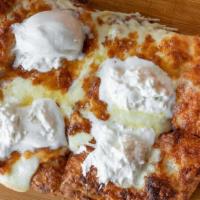 Aphrodite Pizza · Our white pie, white sauce, mozzarella, burrata.