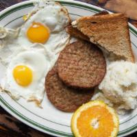 Two Eggs Breakfast · Two eggs, to order, served with toast, bacon or sausage and cheese grits, potato hash or fre...