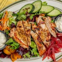 Grilled Chicken Goddess Salad · Marinated grilled chicken, baby greens, cucumbers, baby heirloom tomatoes, carrots, pickled ...