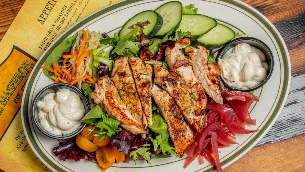 Grilled Chicken Goddess Salad · Marinated grilled chicken, baby greens, cucumbers, baby heirloom tomatoes, carrots, pickled onions and our own green Goddess & creole dressings.