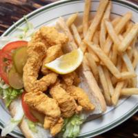 Southern Fried Fish Po-Boy · Golden fried Gulf fish strips dressed with lettuce, tomato, pickle and tabasco mayo.
