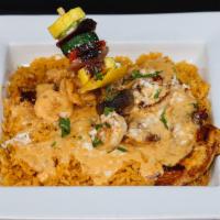Pollo Costeño · Grilled Chicken Breast Marinated Overnight / Served On A Bed Of Rice / Six Grilled Shrimp / ...