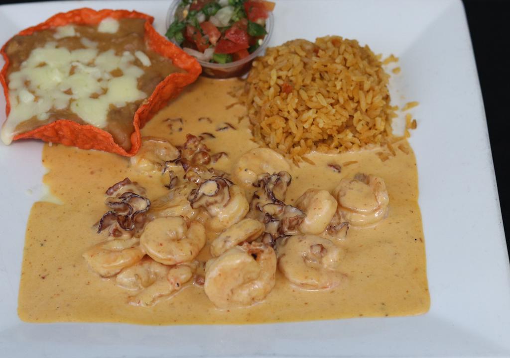 Camaron Fundido · 12 Grilled Shrimp / With Our Creamy Cheese-Chipotle Sauce / Bacon / Served With Rice / Refried Beans / Pico De Gallo & Three Flour Tortillas.