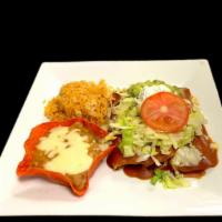 Enchiladas Mexicanas · Three Chicken Enchiladas / Topped With Enchilada Sauce / Cheese / Lettuce / Sour Cream / Gua...