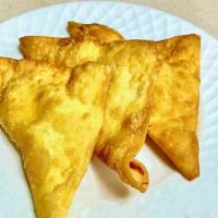 Crab Rangoon (4 Pcs) · Sweet cream cheese with onions and imitation crab meat wrapped in light fluffy fried pastry.