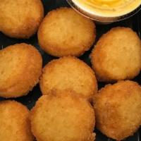 Fried Scallop Cakes (10 Pcs) With Yum Yum Sauce · Fried Scallops Nuggets with our  house Yum Yum Sauce. (10pcs)