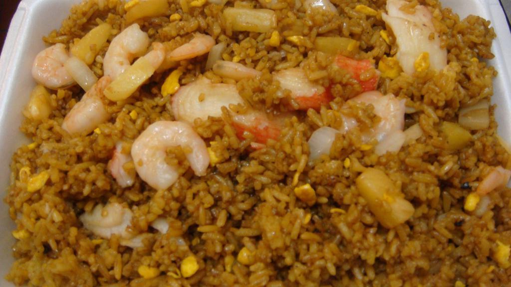 Hawaiian Fried Rice · Fried rice seasoned cooked with Shrimp, imitation crab, onions and egg.