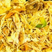 Special Singapore Noodles · Chicken, beef and Shrimp cooked with onions, green peppers, carrots and light curry.