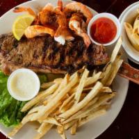 Surf & Turf · A generous 12 ounce NY strip steak and a quarter pound of steamed shrimp.

Consuming raw or ...