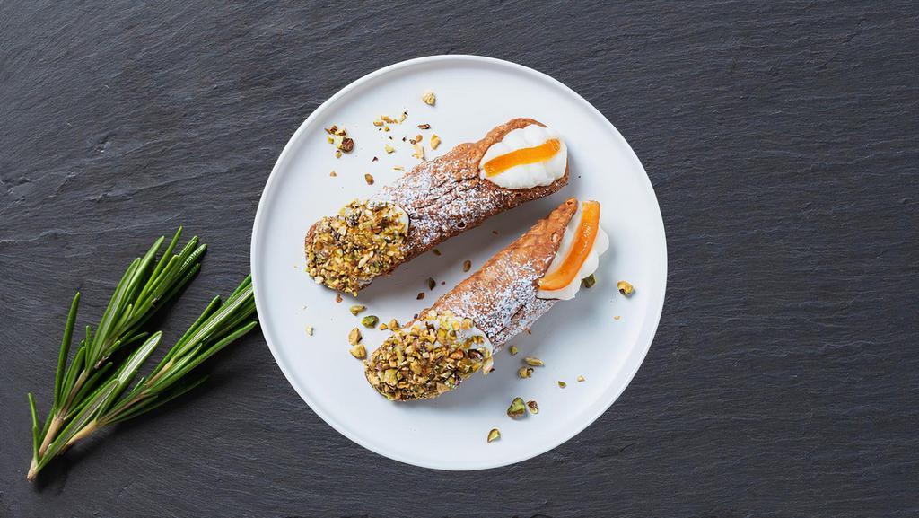 Cannoli Classico · Crisp Italian pastry shell filled with fresh sweetened ricotta cheese & chocolate bits