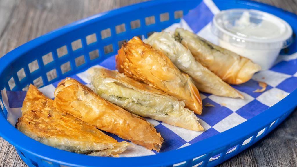 Spanakopita (6) · Puff pastry stuffed with spinach and feta cheese.