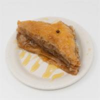 Baklava · Our famous layers of phyllo dough brushed with butter and filled with almonds and walnuts wi...
