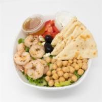 Greek Protein Bowl · Rice pilaf, lettuce, tomato, feta cheese, chickpeas, and choice of lamb, chicken or falafel ...