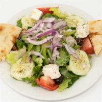 Traditional Greek Salata · Romaine lettuce, tomato, red onion, cucumber, green pepper, kalamata olives and feta cheese ...