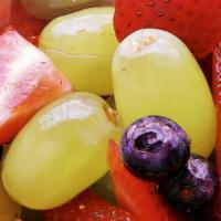 Fresh Fruit Bowl · Fresh fruit bowl of strawberries, blueberries, and seedless green grapes