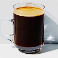 Americano · Our Caffè Americano is prepared by diluting espresso with hot or cold water which gives it a...