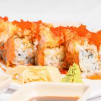 King Roll · Cooked. Tempura shrimp, cucumber will eel, avocado and fish egg. Sauce: eel sauce and masago.