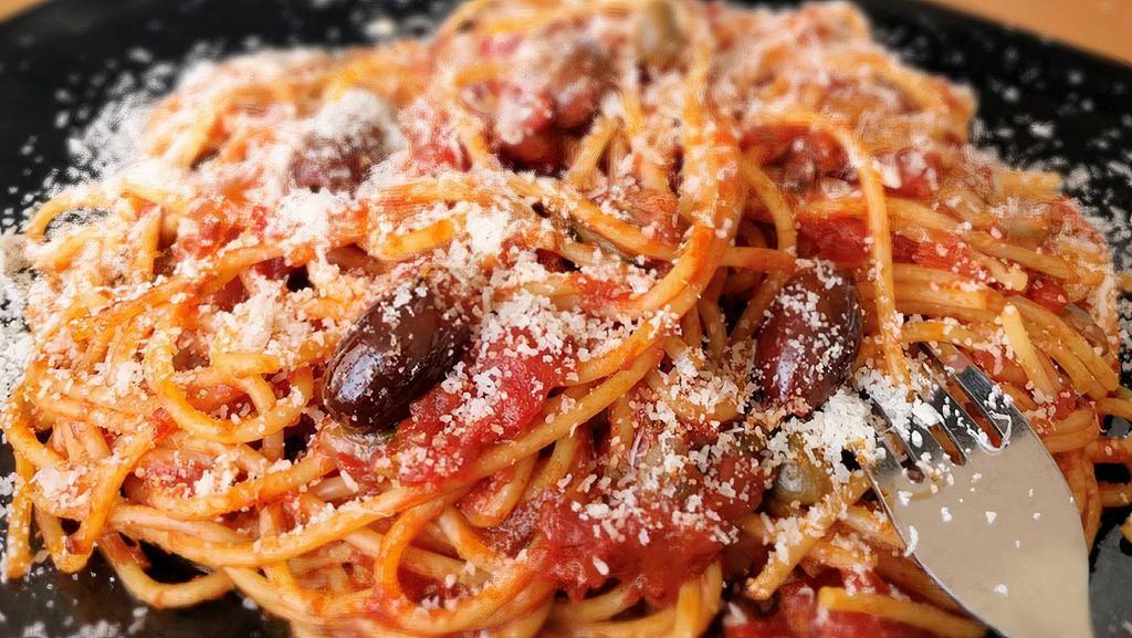 109 Spaghetti Alla Puttanesca · Tomato sauce with onions, crushed red pepper, oregano, black olives, capers, anchovies, Extra Virgin Olive Oil, Parmigiano