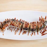 Monster Roll (8 Pcs) · Crab, cucumber and avocado, topped with eel and eel sauce with sesame seed.