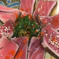 Pepper Tuna · Lightly pan seared pepper tuna served with ponzu sauce. Contains raw fish.