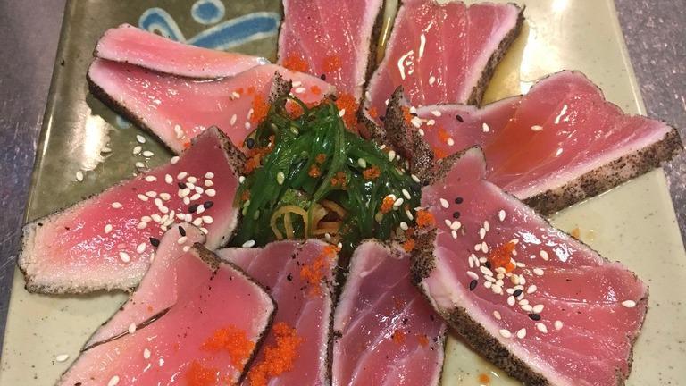 Pepper Tuna · Lightly pan seared pepper tuna served with ponzu sauce. Contains raw fish.