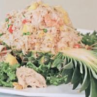 L- Pineapple Fried Rice · Mixed with chicken and shrimp. Mixed with egg, onion, bean sprouts, peas and carrots.