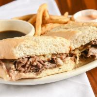 Prime Dip · Limited availability. Favorite. Shaved prime rib on a toasted French roll topped with sautée...