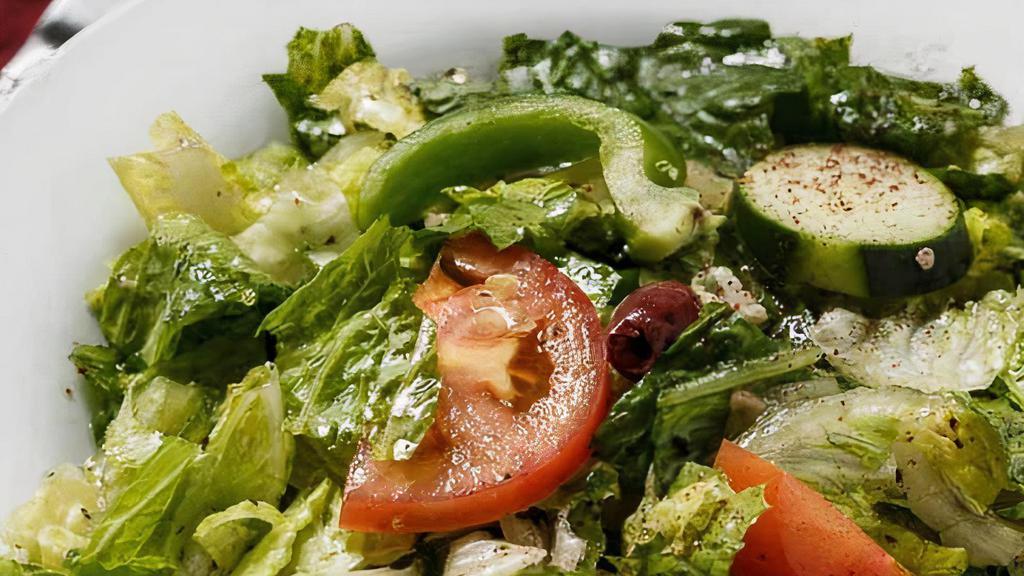 Fatoush Salad  · Toasted pita bread salad with vinaigrette house dressing