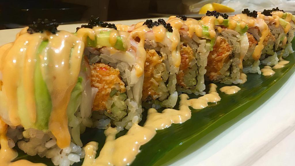 Tiger Roll · Contains Raw Fish. Tuna, salmon, red snapper, white tuna, avocado wrapped with soy paper.