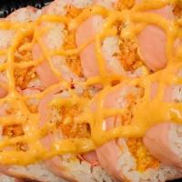 Spicy Girl Roll · Contains Raw Fish. Spicy. Spicy tuna, salmon crunchy inside, spicy yellowtail, fish egg, sca...