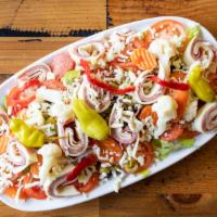 Antipasto Salad · Lettuce, salami, pepperoni, tomato, provolone, ham, giardiniera, mozzarella, green and black...
