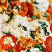 Margherita Pizza · 12'' small pizza, cut to 6 slices. Fresh mozzarella cheese, fresh tomatoes and fresh basil