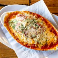 Homemade Meat Lasagna · Served with bread