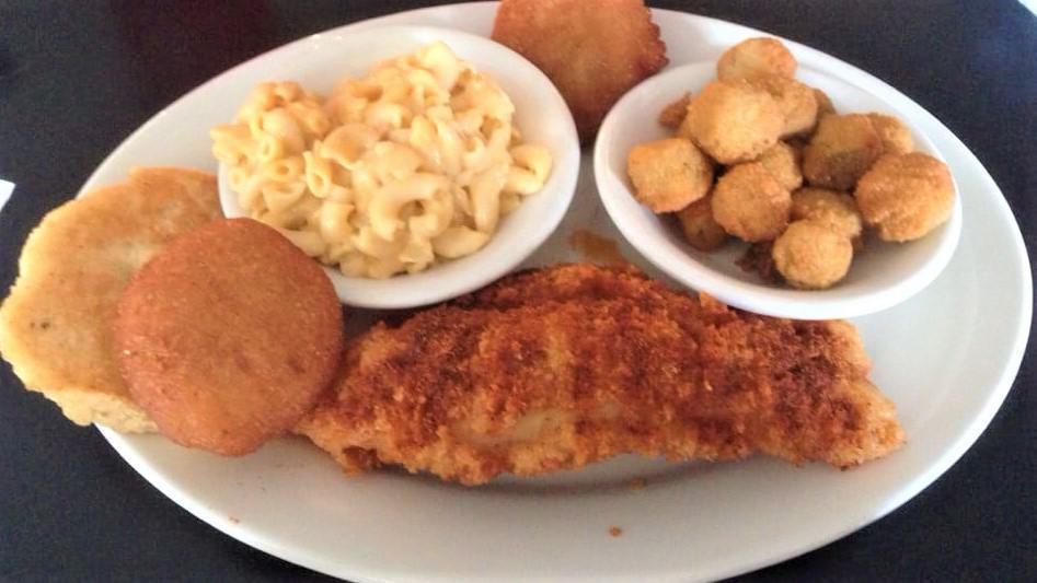 Cajun Catfish · Served with two sides and bread.