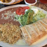 Lunch Special, No. 5  · One ground beef burrito, one taco and choice of rice or beans.