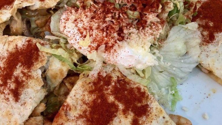 Potrillo Snack Platter · Enough to share! Fajita-style chicken or steak nachos, cheese quesadillas, chicken flautas, lettuce, sour cream, guacamole and pico De gallo.