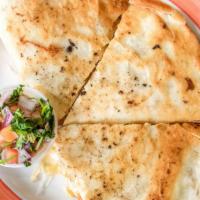 Quesadilla · Served with salsa and sour cream. Chicken or Steak for an additional charge.