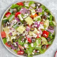 Greek Salad · Crumbled feta, black olives, sliced cucumber, tomatoes, red onions, green peppers tossed ove...