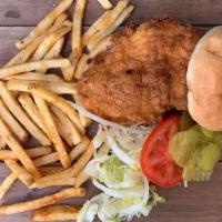 The Piper · Free-range hand-breaded chicken breast fried and topped with shredded lettuce, tomato, pickl...