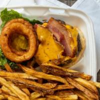 24K Burger · Certified Angus beef burger with lettuce, tomato, fried onion ring, cheese, bacon, with a sp...